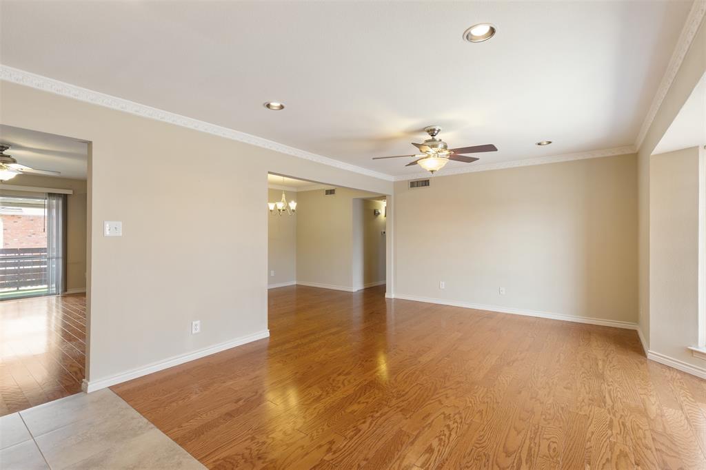 4709 Skillman Street, Unit D Dallas, TX 75206 - Photo 2 of 28 a view of a livingroom with a ceiling fan and window