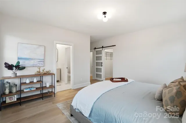 a bedroom with a bed and a cabinets