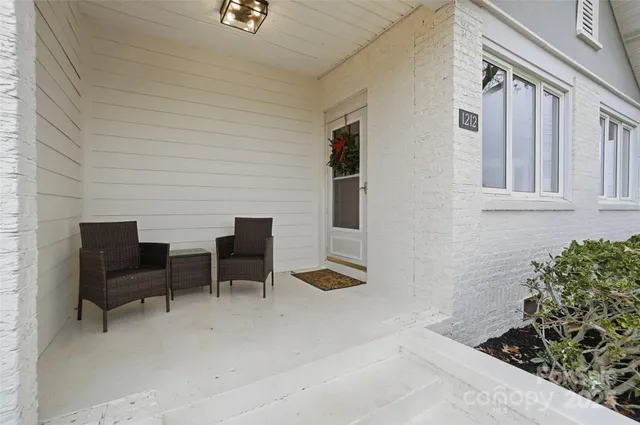 a outdoor space with patio furniture and potted plants