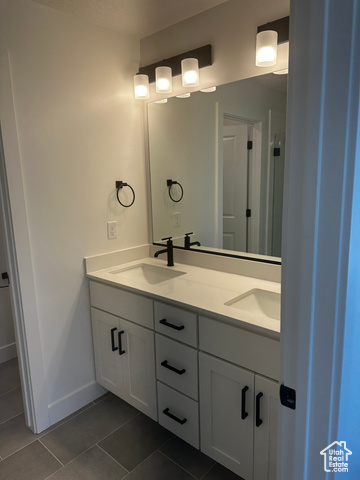 22 South Starlight Lane Mapleton, UT 84664 - Photo 9 of 17 Full bathroom with double vanity and tile patterned flooring