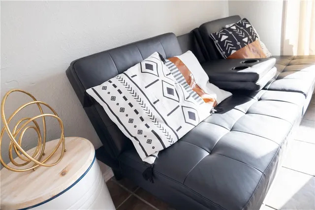 a view of a bedroom with a bed