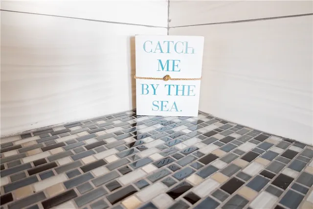 a very nice looking room with a black white checkered floor