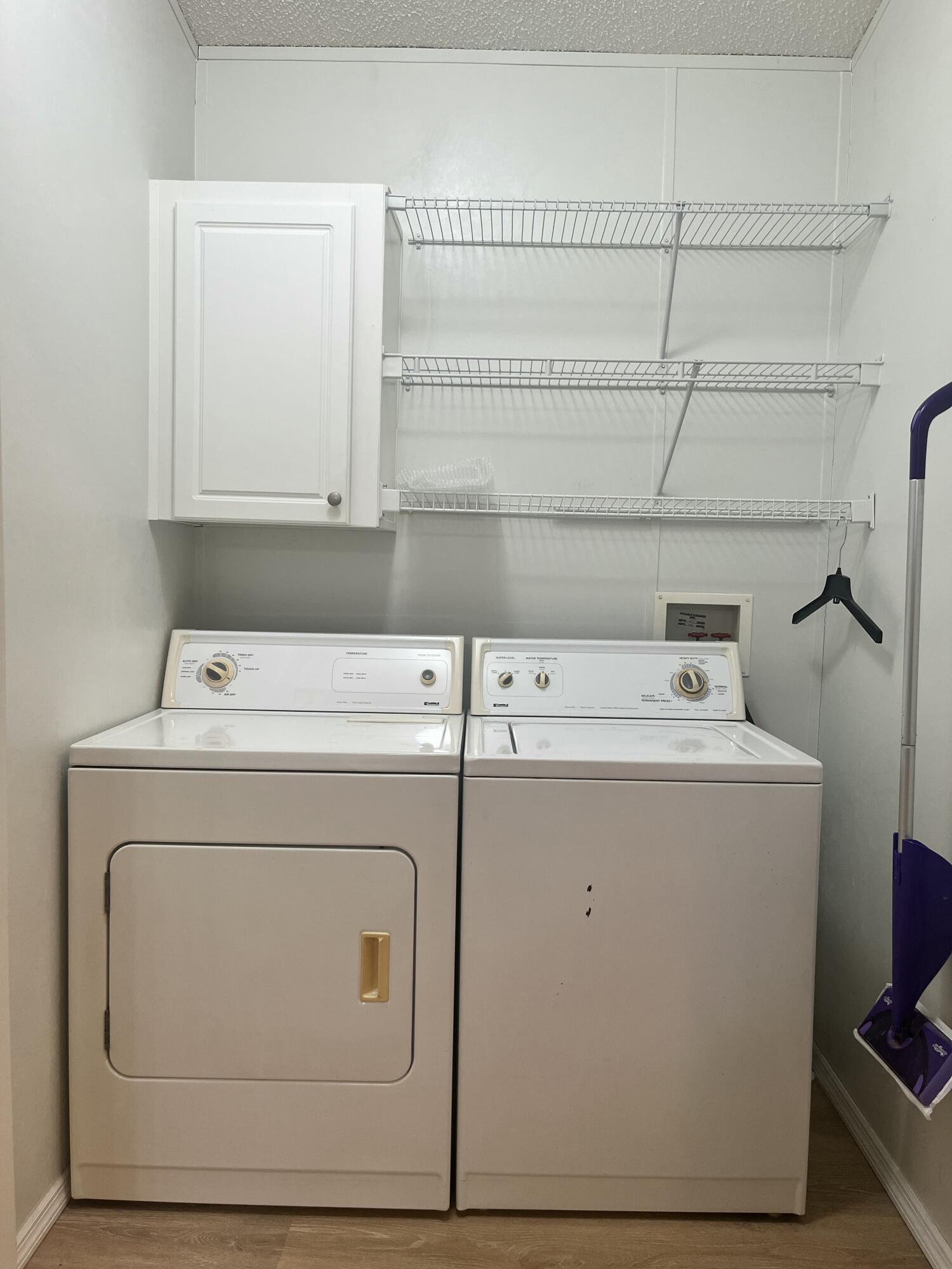 4064 Southwest 9th Way Okeechobee, FL 34974 - Photo 18 of 39 a utility room with dryer and washer