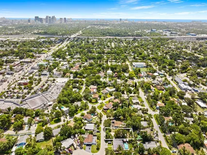 a view of a city with an ocean