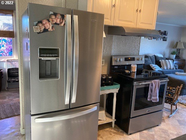 1420 Southwest Goodwin Place Pendleton, OR 97801 - Photo 13 of 27 a kitchen with stainless steel appliances granite countertop a refrigerator and a stove