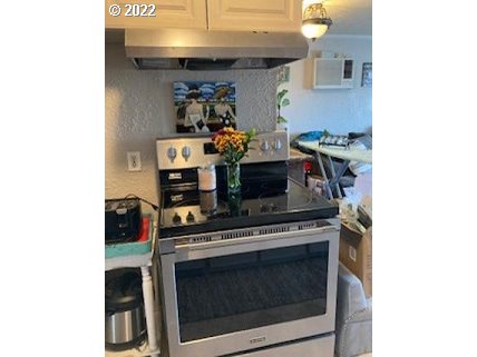 1420 Southwest Goodwin Place Pendleton, OR 97801 - Photo 15 of 27 a stove top oven sitting inside of a kitchen