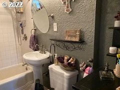 1420 Southwest Goodwin Place Pendleton, OR 97801 - Photo 21 of 27 a bathroom with a sink toilet and shower