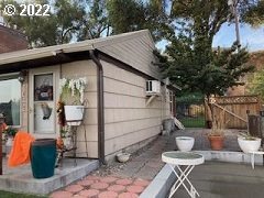 1420 Southwest Goodwin Place Pendleton, OR 97801 - Photo 4 of 27 a view of backyard with outdoor seating and a tree