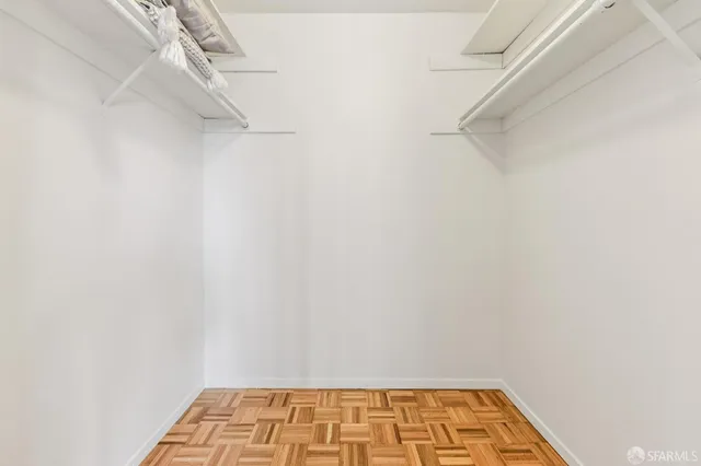 a view of a room with white walls