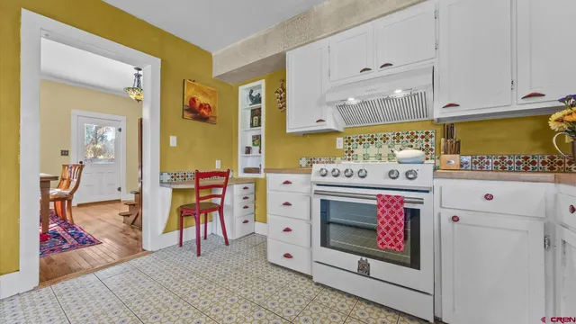 a bedroom with a bed and a cabinets