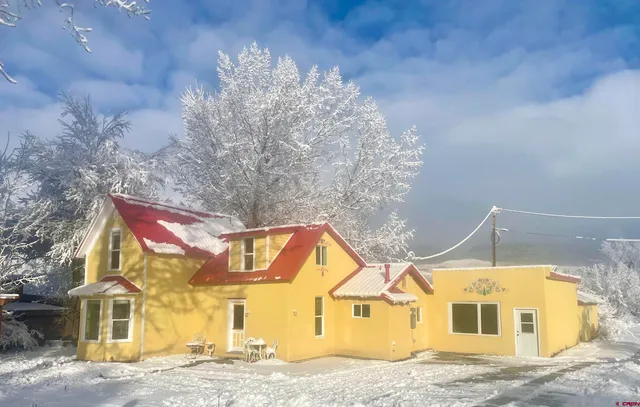a front view of a house with a garage