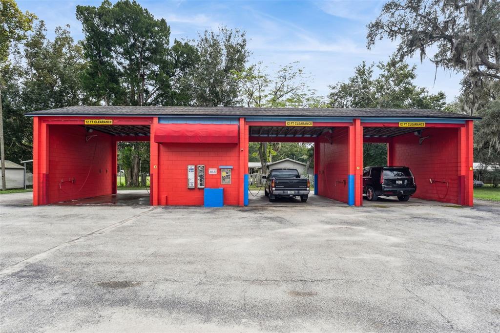 21944 Highway 40 Astor, FL 32102 - Photo 1 of 18 a view of a car park in front of garage