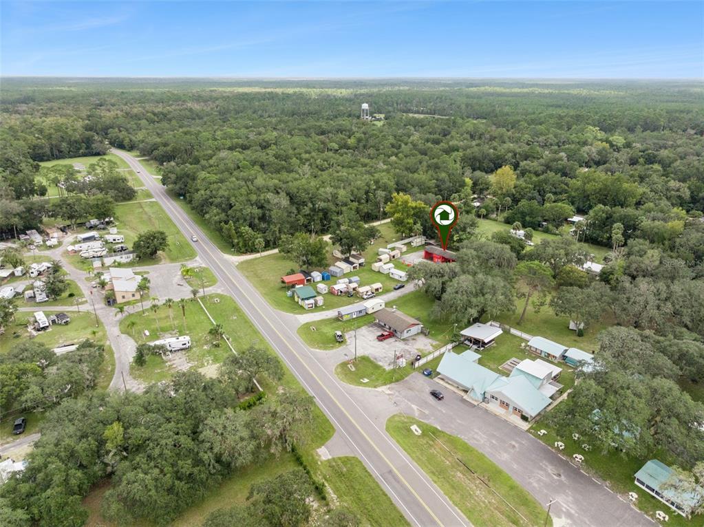 21944 Highway 40 Astor, FL 32102 - Photo 16 of 18 an aerial view of residential houses with outdoor space