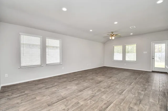 a bathroom with a glass shower door