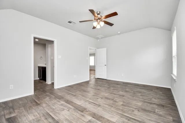 a view of an empty walk in closet