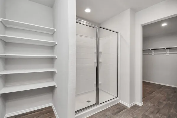 a view of a lake with a house in the background