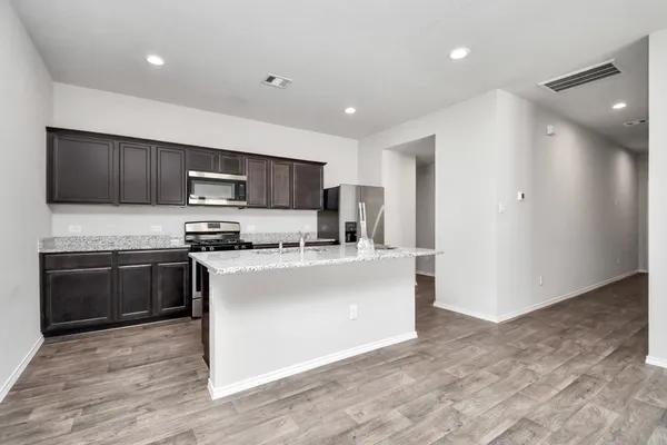 a bathroom with a sink a vanity and a mirror