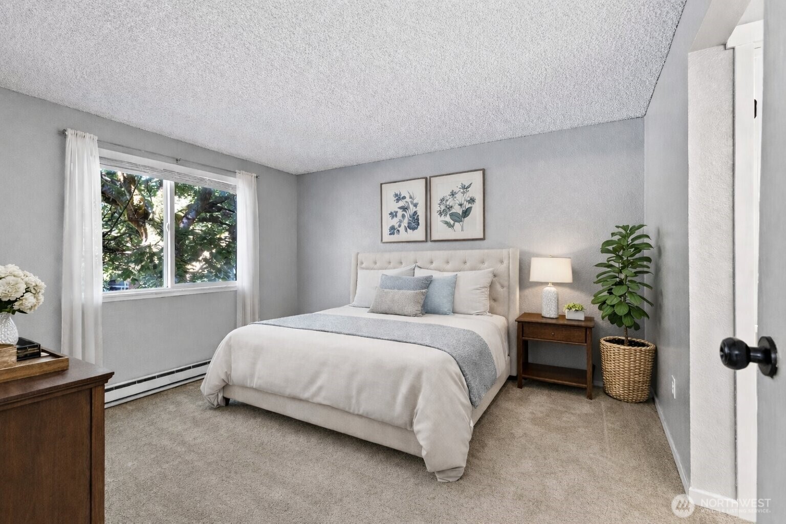 820 Cady Road, Unit H203 Everett, WA 98203 - Photo 14 of 30 a bedroom with a bed and a window