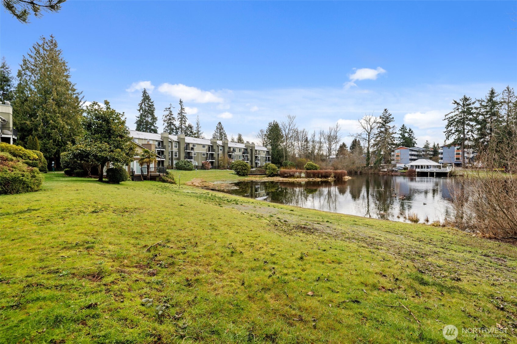 820 Cady Road, Unit H203 Everett, WA 98203 - Photo 24 of 30 a view of a lake with houses