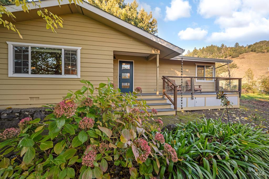 a house view with a garden space