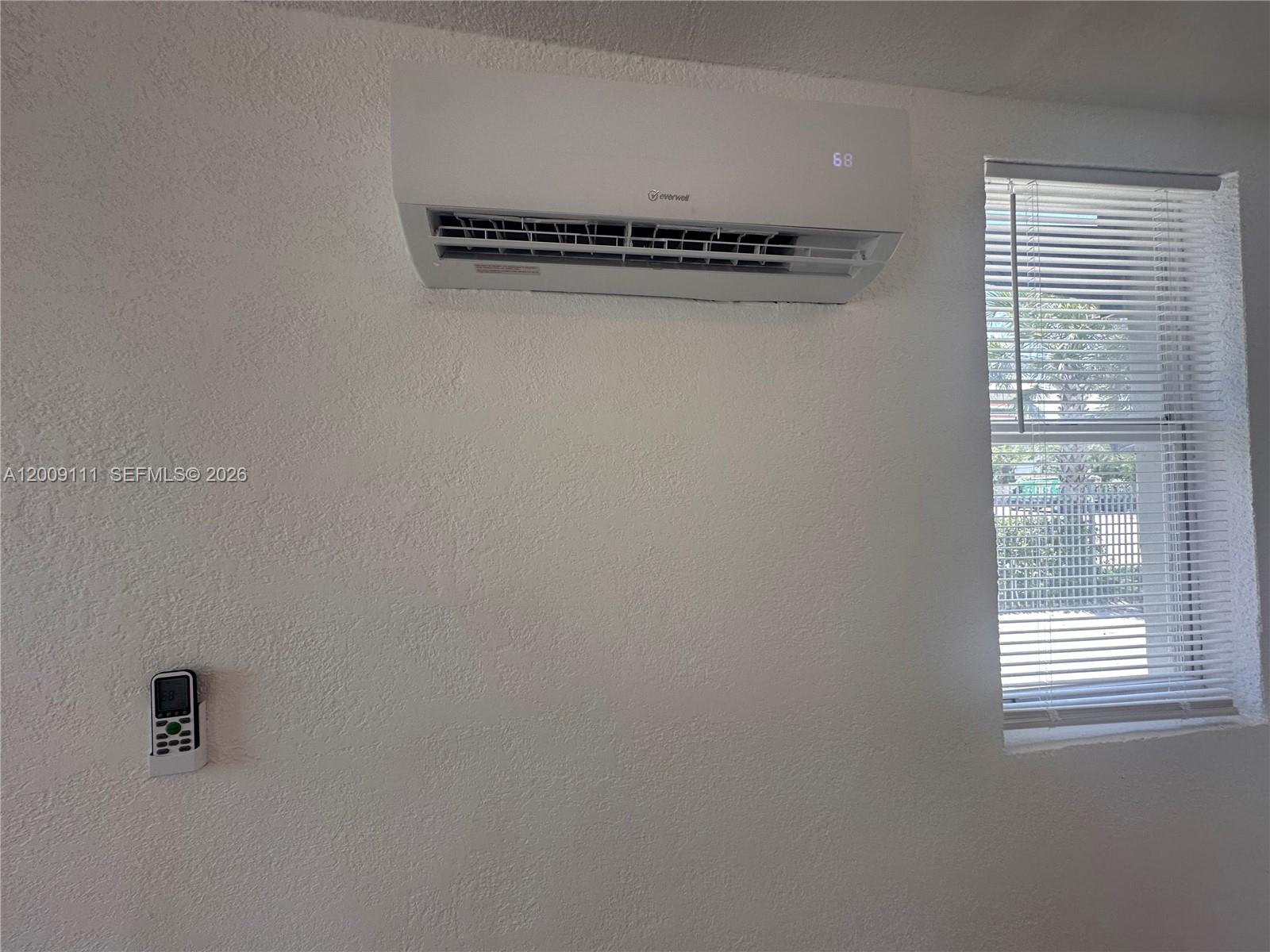50 Northwest 79th Street, Unit 6 Miami, FL 33150 - Photo 13 of 30 a view of a rack on the wall