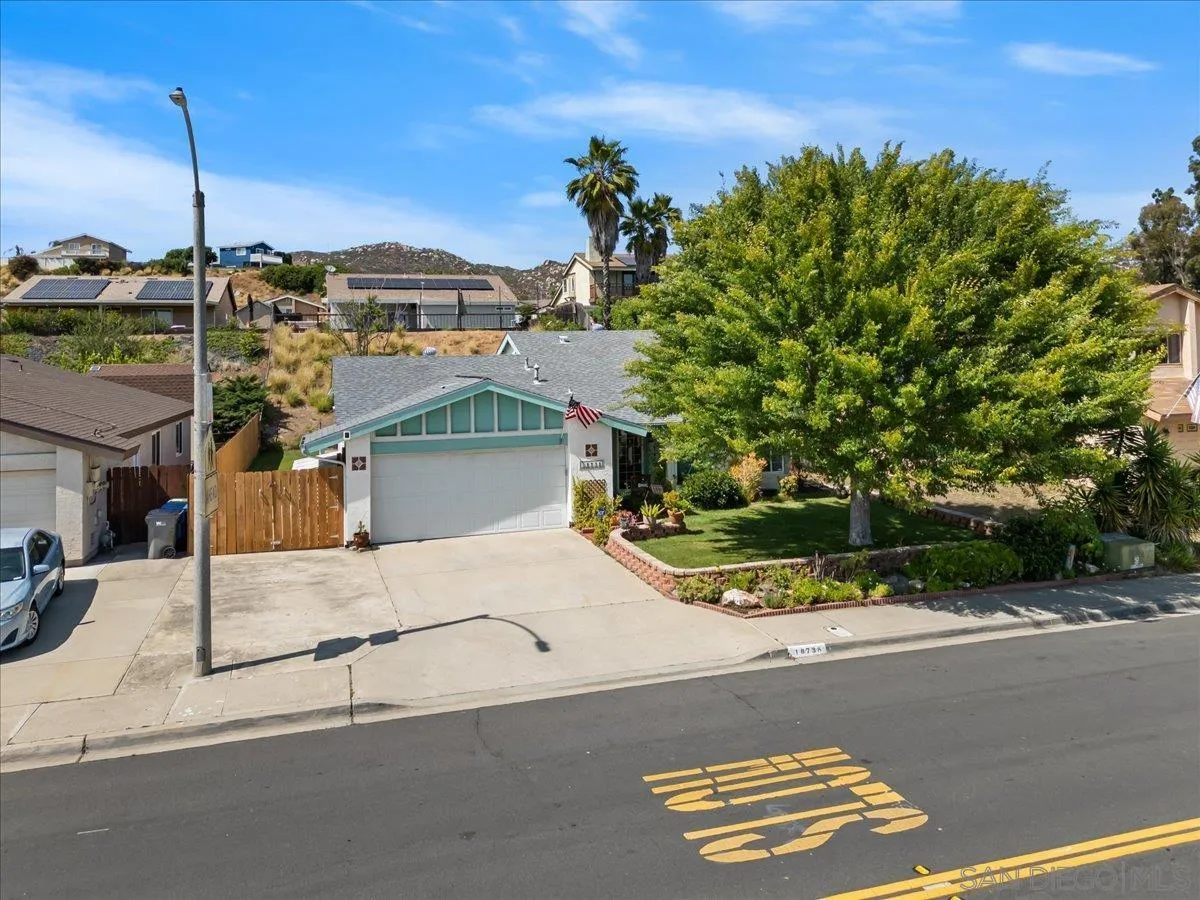 10738 2nd Street Santee, CA 92071 - Photo 46 of 52 a front view of a house with a yard