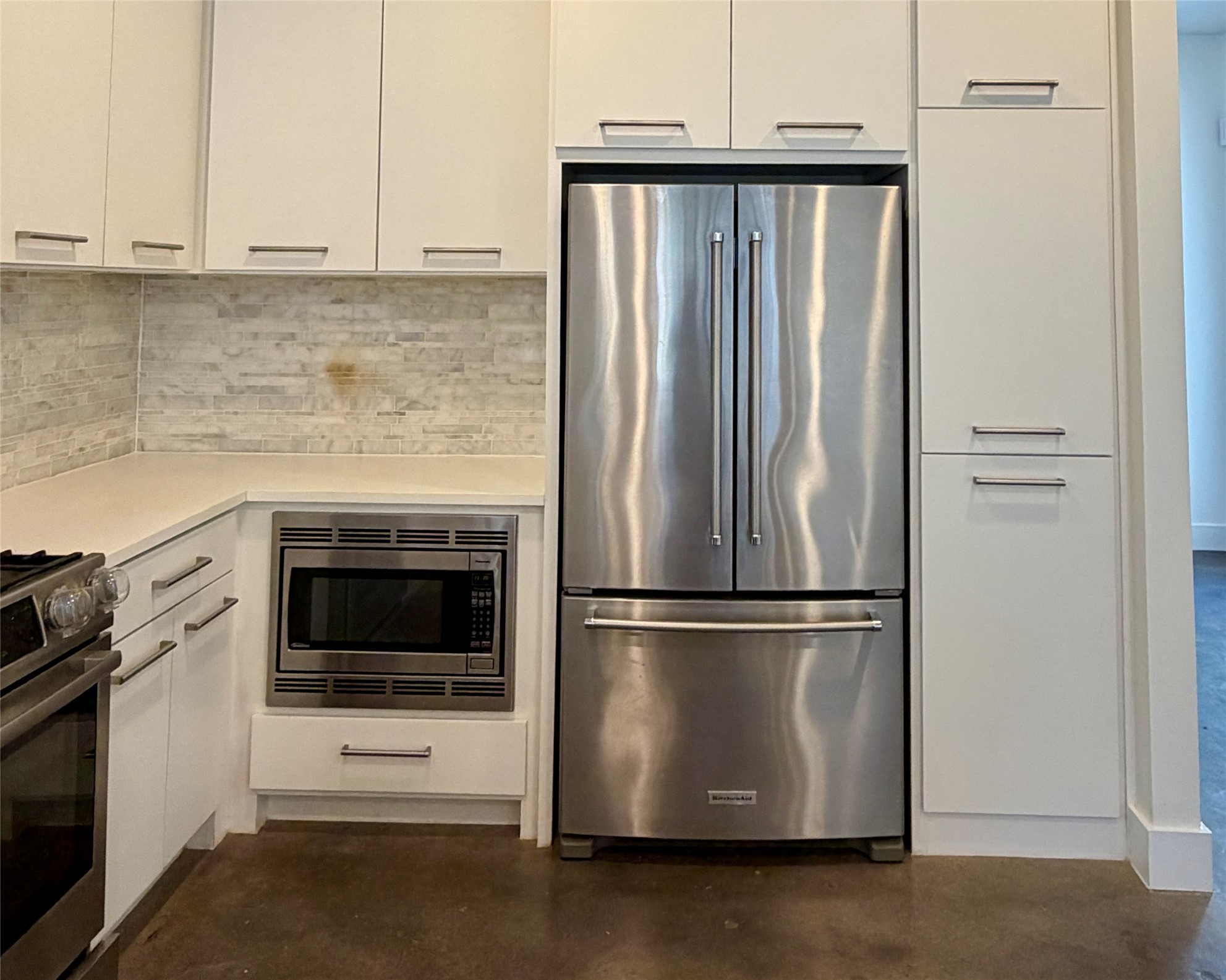 1515 Hether Street, Unit B Austin, TX 78704 - Photo 4 of 30 A well-appointed culinary space showcasing modern appliances and streamlined cabinetry.