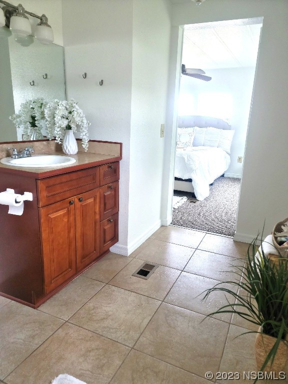 134 Douglas Street Edgewater, FL 32141 - Photo 14 of 27 a bathroom with a sink and a mirror
