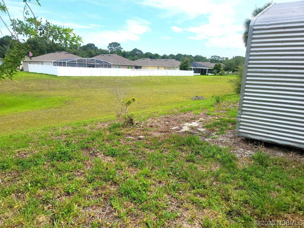 134 Douglas Street Edgewater, FL 32141 - Photo 23 of 27 a view of an ocean from a building