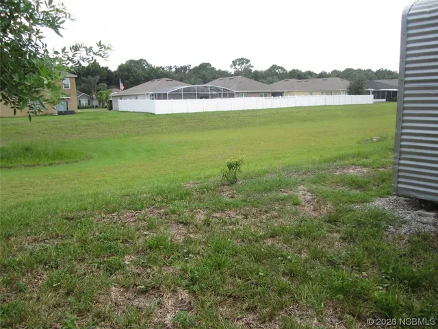 a view of a lake with a city