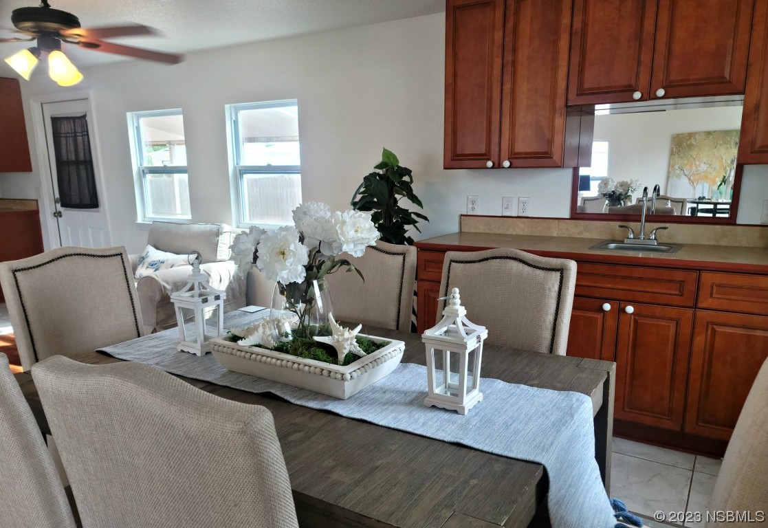 134 Douglas Street Edgewater, FL 32141 - Photo 5 of 27 a living room with furniture and wooden floor