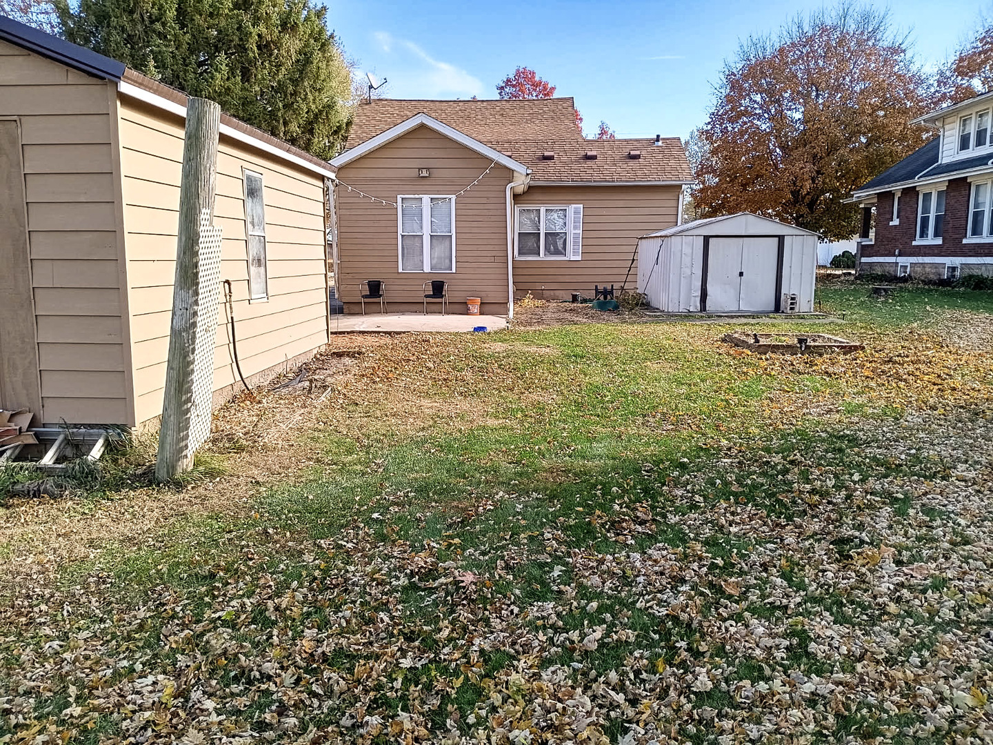 203 North Main Coleta, IL 61081 - Photo 33 of 36 a front view of a house with a yard