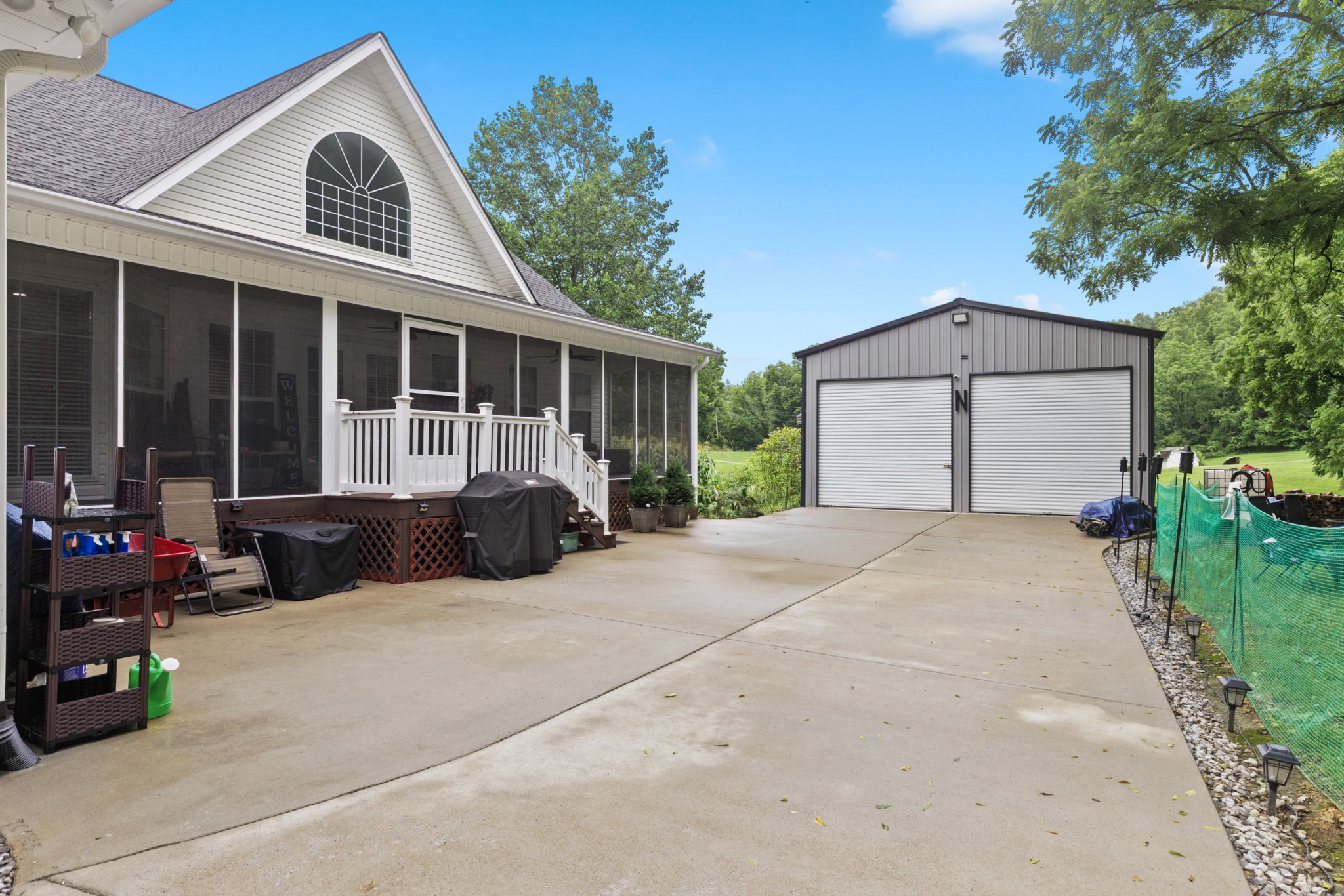 454 Campbell Hollow Road Bethpage, TN 37022 - Photo 49 of 57 a view of a house with couches and yard
