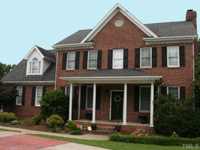 2405 Trellis Court Raleigh, NC 27616 - Photo 1 of 23 Beautiful all-brick home in neighborhood of brick homes. Mature landscaping, circular driveway, stylish front porch.