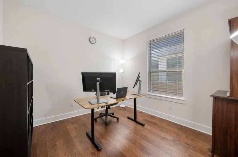 344 Pisa Lane Georgetown, TX 78628 - Photo 16 of 39 Warm hardwood flooring and a classic window frame define this versatile office space.