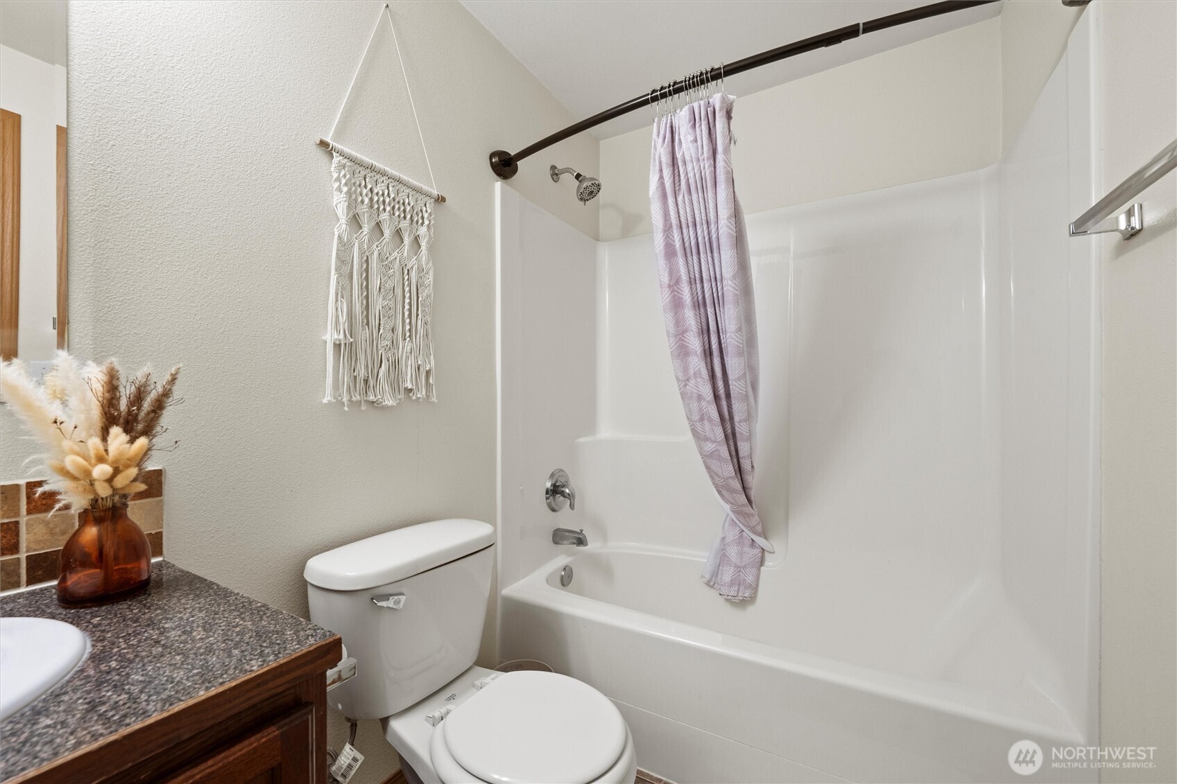 682 L Street Southeast Ephrata, WA 98823 - Photo 25 of 40 a bathroom with a granite countertop sink toilet and shower
