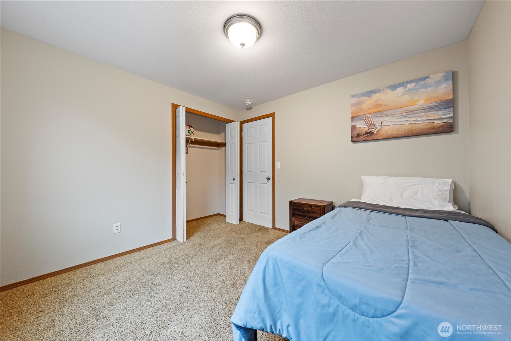 682 L Street Southeast Ephrata, WA 98823 - Photo 27 of 40 a bedroom with a bed and a painting on the wall