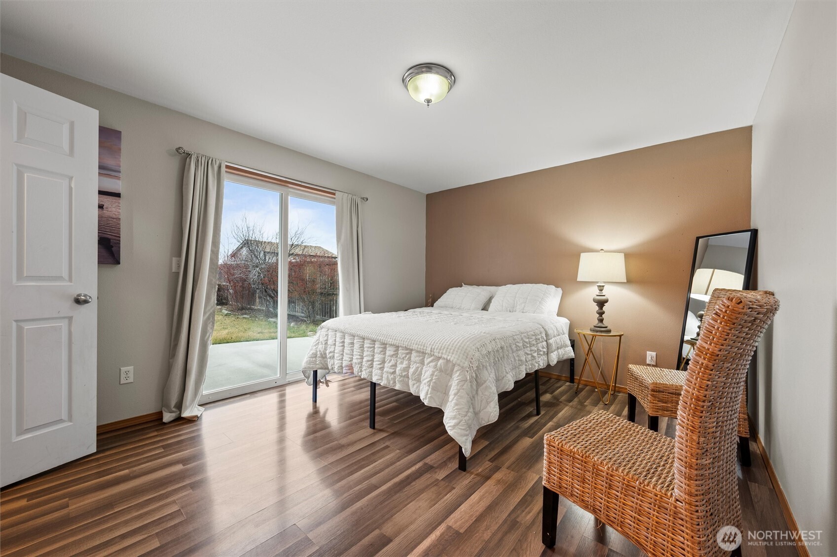 682 L Street Southeast Ephrata, WA 98823 - Photo 28 of 40 a bedroom with a bed and wooden floor