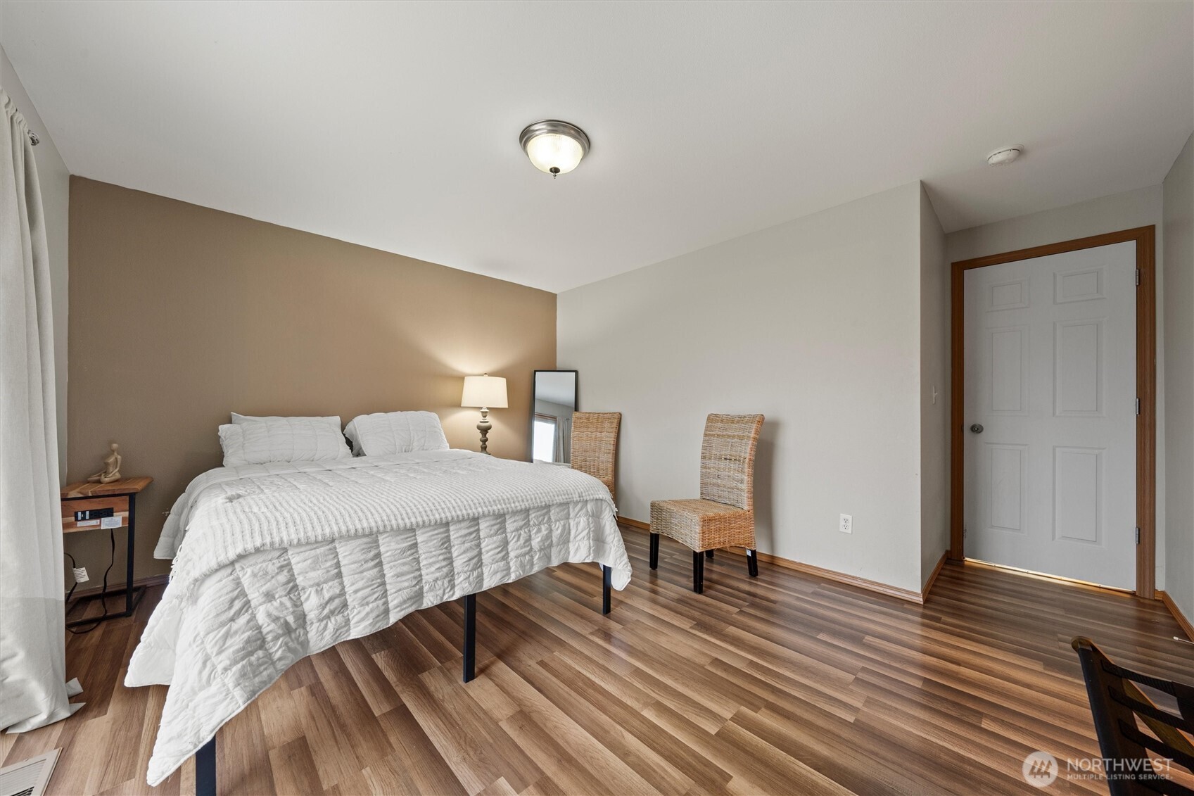 682 L Street Southeast Ephrata, WA 98823 - Photo 29 of 40 a bedroom with a bed and wooden floor