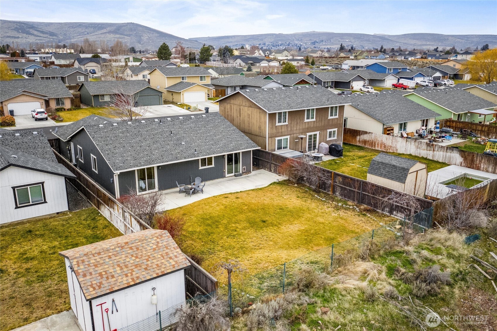 682 L Street Southeast Ephrata, WA 98823 - Photo 37 of 40 an aerial view of residential houses with yard and mountain view