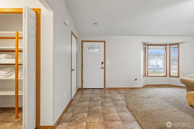 a view of an empty room and window