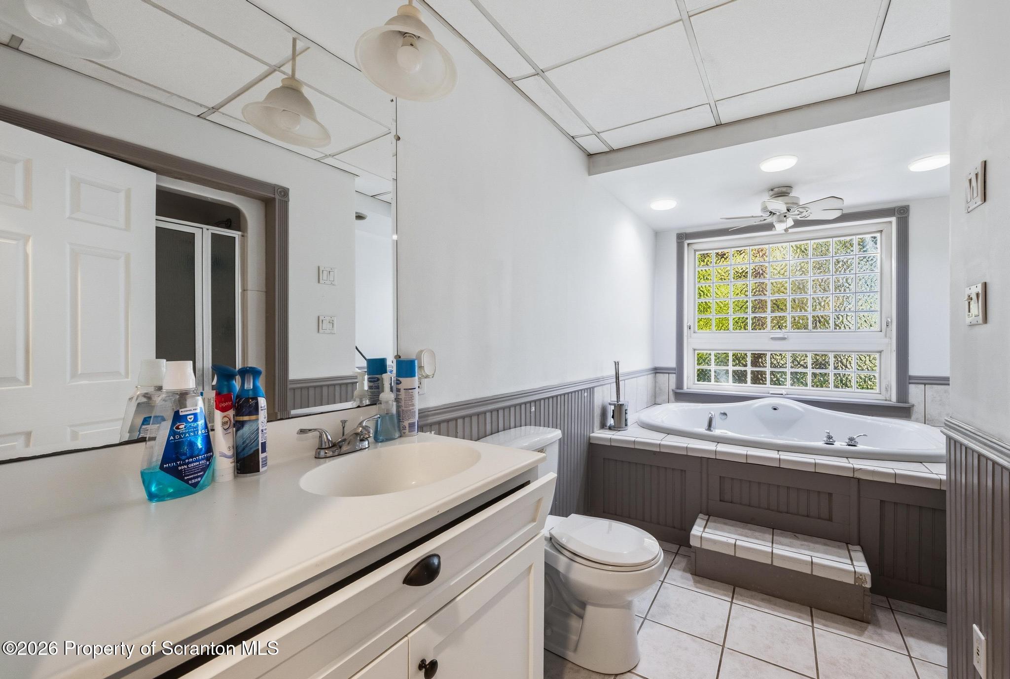 518 Prospect Avenue Scranton, PA 18505 - Photo 26 of 59 a bathroom with a double vanity sink toilet and a tub