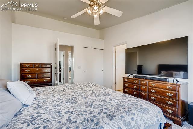 6652 Hannah Rose Road Colorado Springs, CO 80923 - Photo 15 of 28 Master bedroom includes a "his & hers" two separate closet spaces and an adjoining bath.