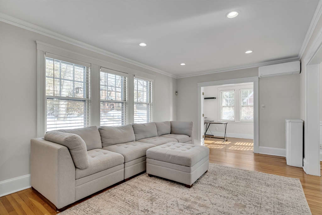 10 Dexter Road Lexington, MA 02420 - Photo 4 of 35 a living room with furniture and a large window