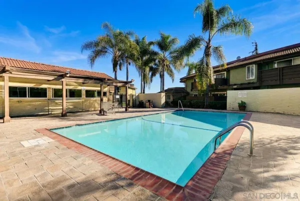 a view of a house with a swimming pool