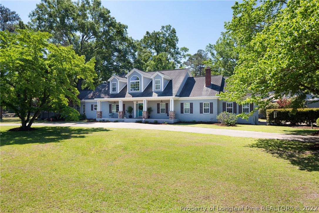 5016 J T Matthews Road Godwin, NC 28344 - Photo 1 of 50 a front view of a house with a big yard