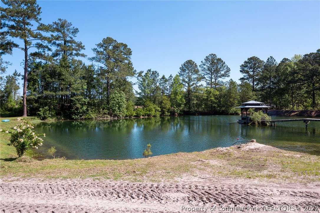 5016 J T Matthews Road Godwin, NC 28344 - Photo 47 of 50 a view of a lake