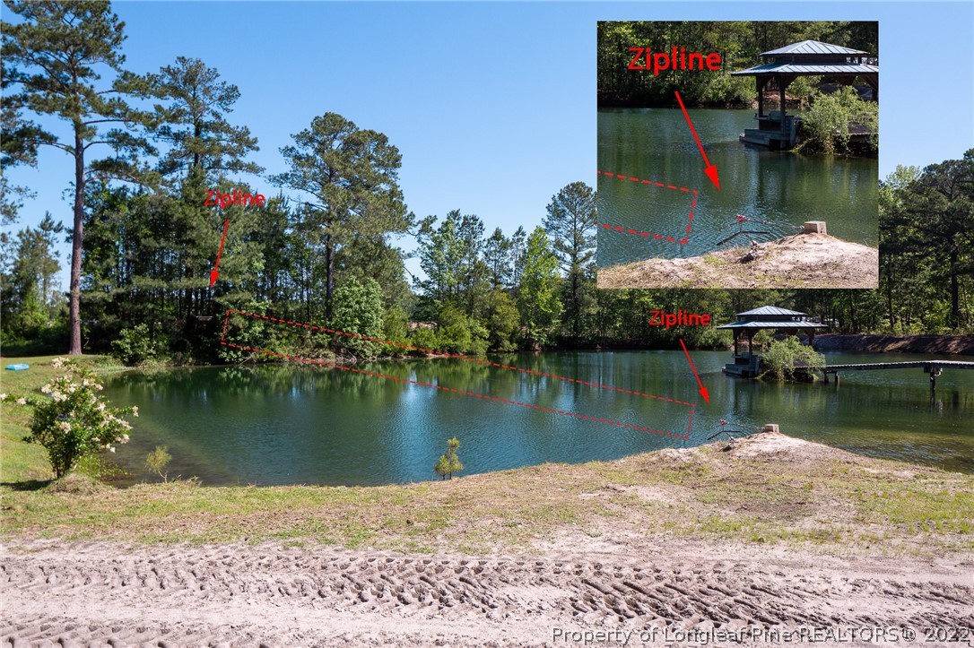 5016 J T Matthews Road Godwin, NC 28344 - Photo 48 of 50 a view of a lake with a large bridge