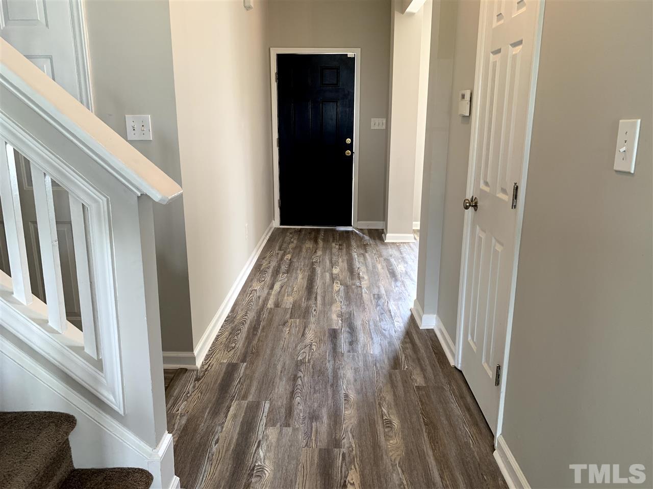 1929 Red Quartz Drive Raleigh, NC 27610 - Photo 2 of 12 beautiful entrance . Formal dining area next to hall.