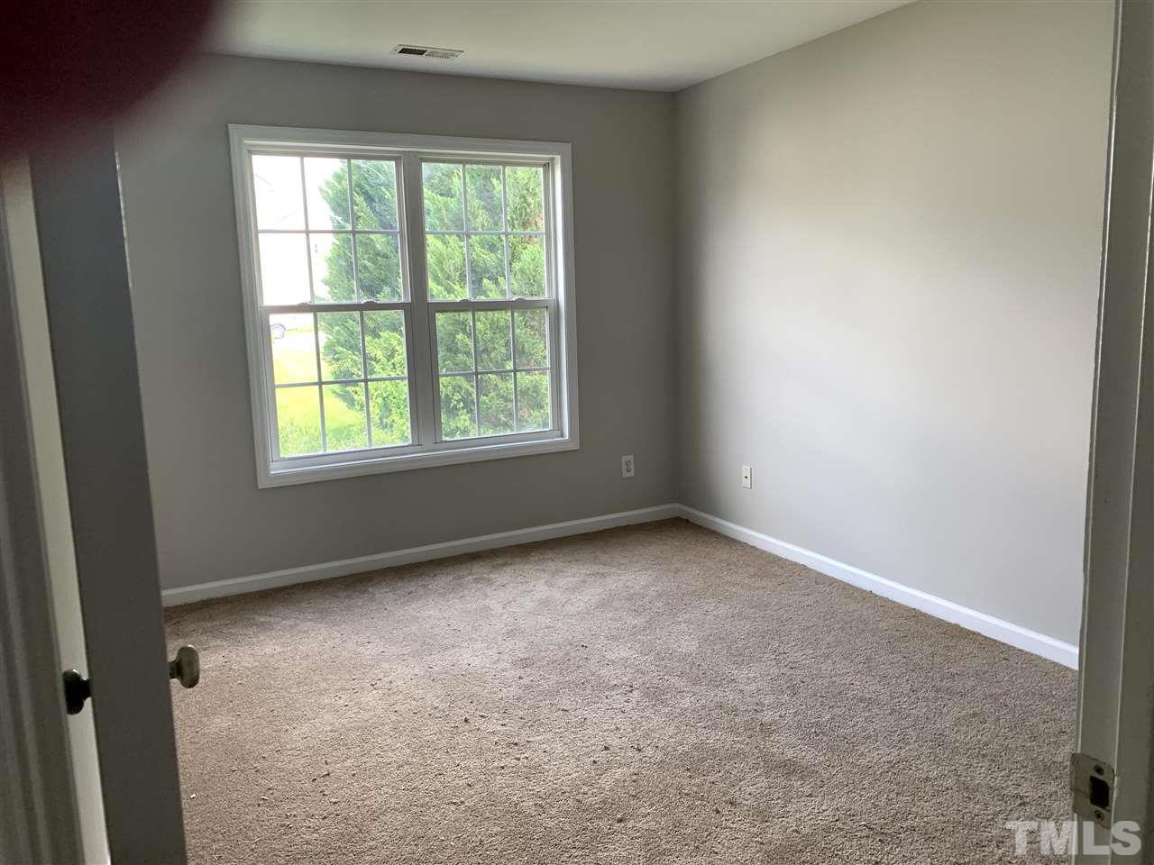 1929 Red Quartz Drive Raleigh, NC 27610 - Photo 6 of 12 large rooms upstairs with lots of light and large closets.